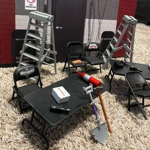 Wrestling figure accessories, miscellaneous pieces shown -backdrop not included